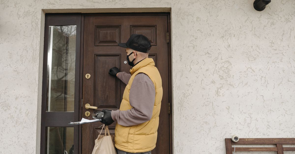 locksmith unlocking front door — Purple Locksmith NYC